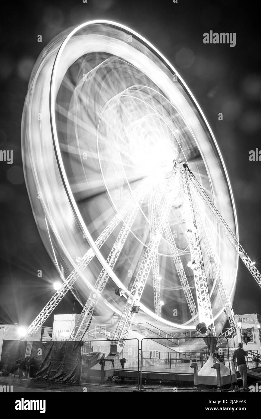 Long exposure of a Ferris wheel at a travelling fairground near Seaburn, Sunderland, UK Stock Photo