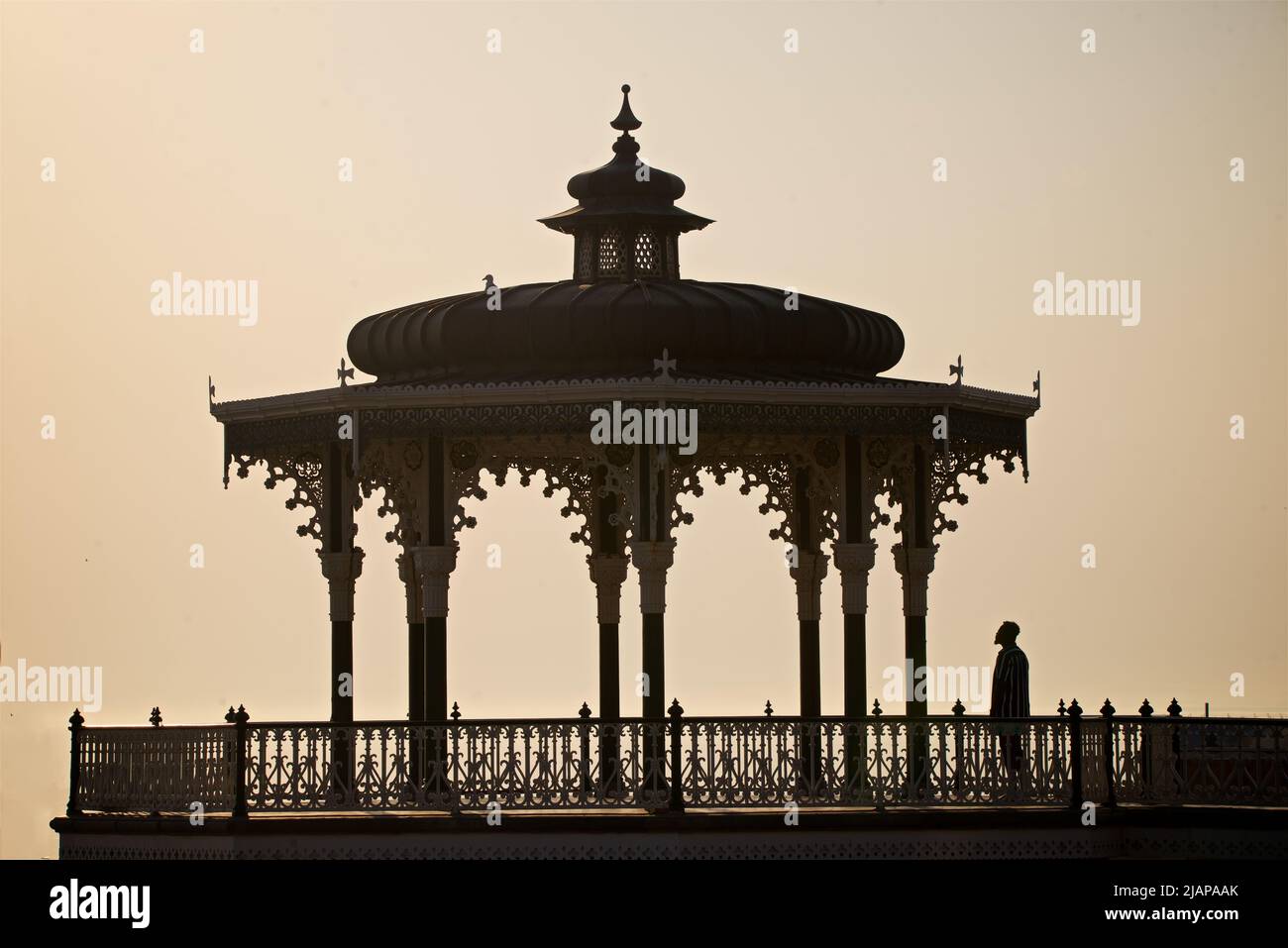 Brighton's Victorian Bandstand. Brighton & Hove, East Sussex, England. Dusky pink sky at dusk. Stock Photo