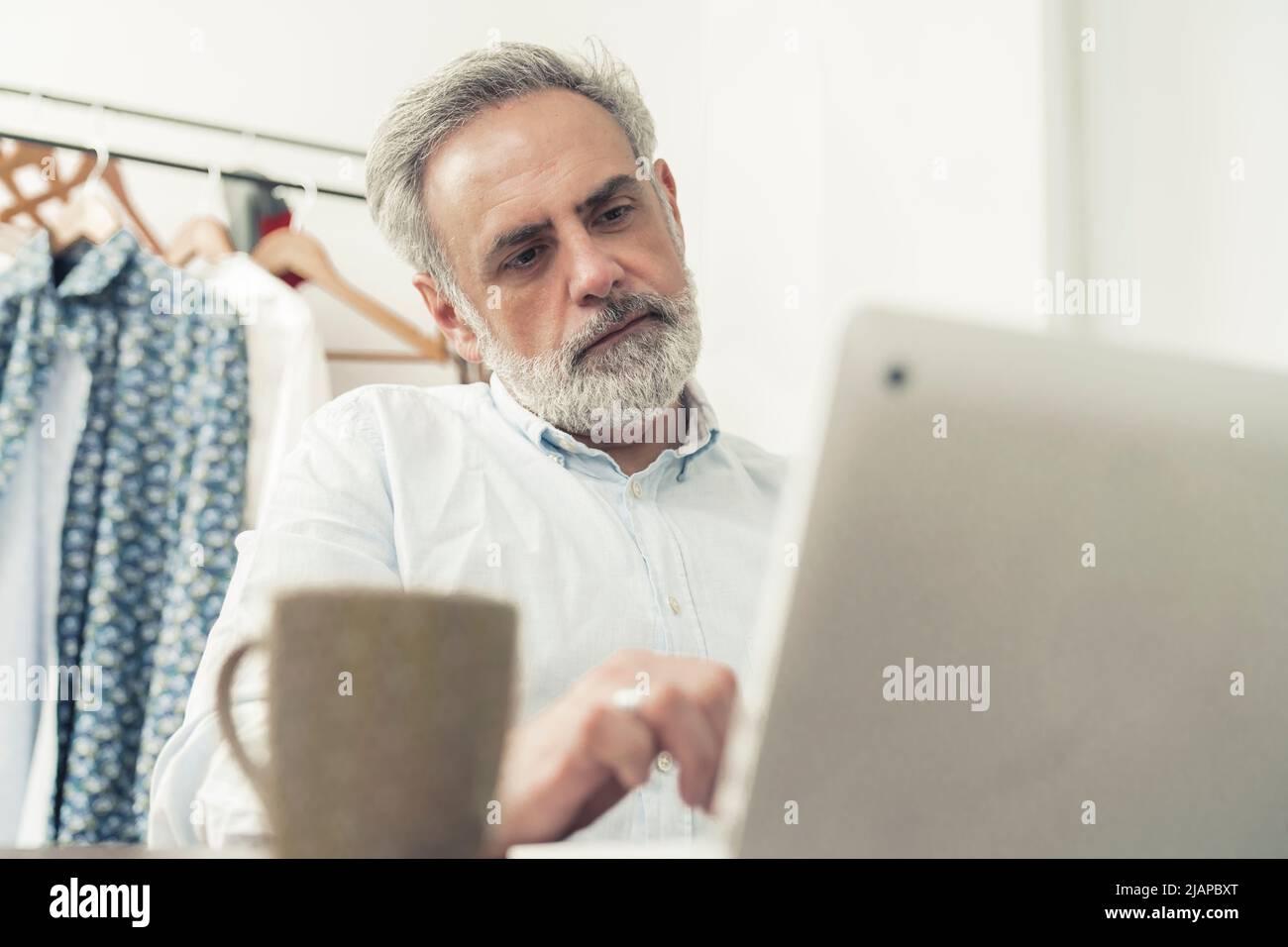Old man grey beard computer hi-res stock photography and images - Alamy