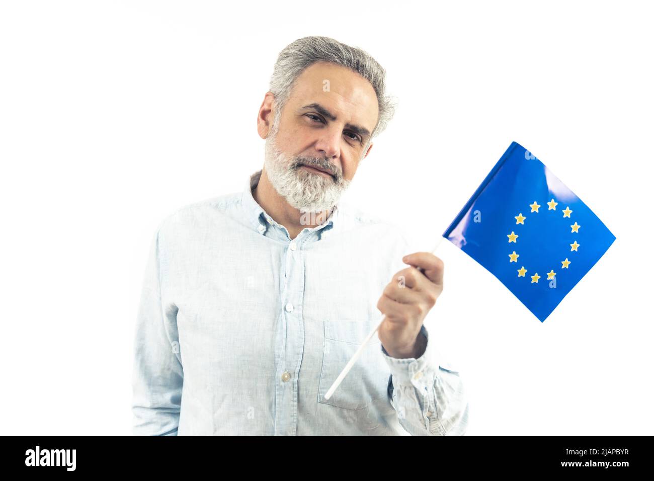 Middle-aged enterprenuer holding an EU flag - isolated white background. High quality photo Stock Photo