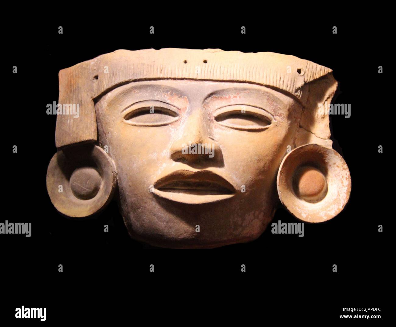 Ceramic mask from Teotihuacan, Mexico City, Mexico.  Ancient Americas Gallery, Field Museum of Natural History, Chicago, Illinois, USA. Editorial Use Only. Stock Photo