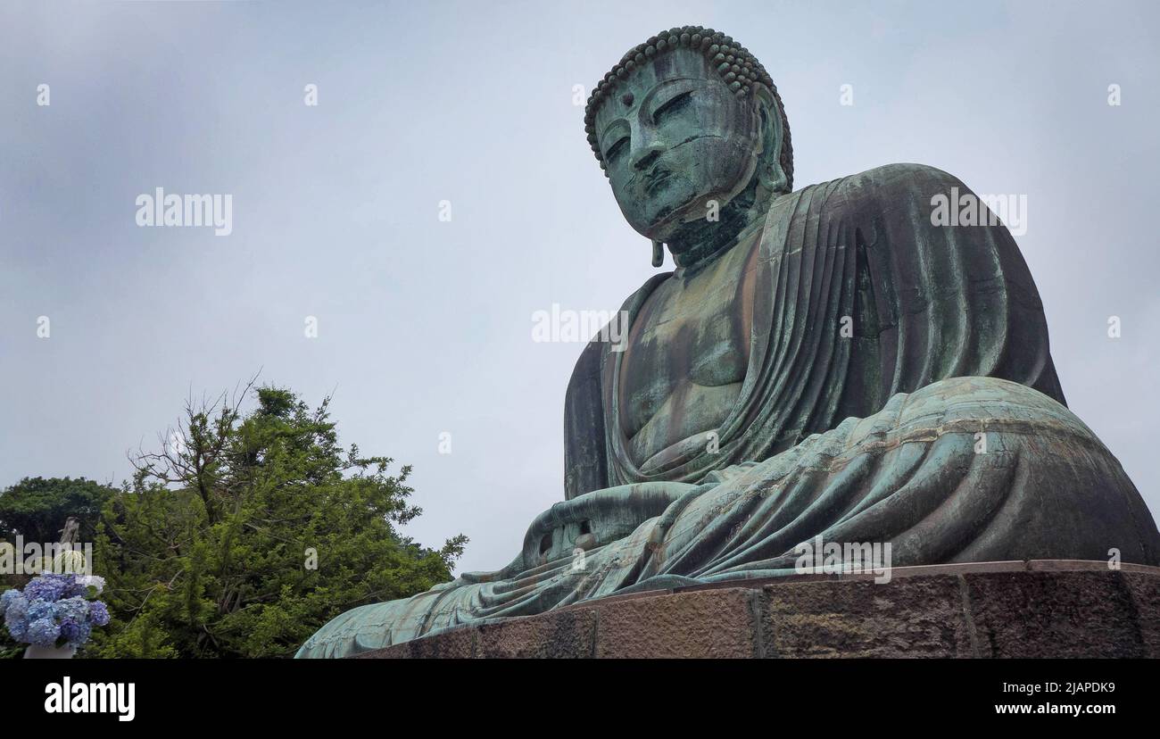 The Great Buddha of Kamakura (Kamakura Daibutsu) is a large bronze ...