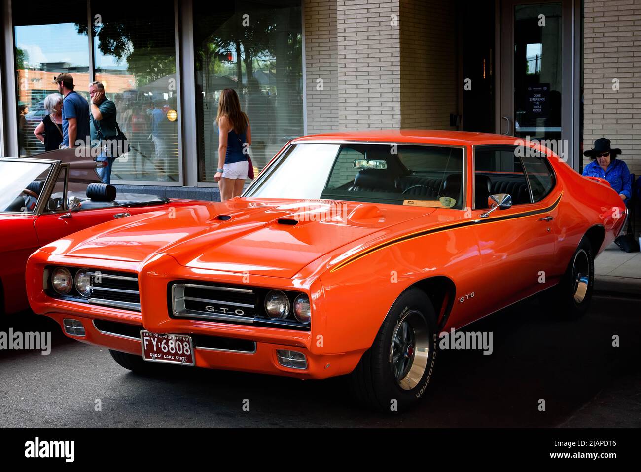 A 1969 Pontiac GTO photographed at the 2015 Woodward Dream Cruise,  The Woodward Dream Cruise event is an automotive enthusiast event held annually on the third Saturday of August in Metropolitan Detroit, Michigan, along Woodward Avenue, a major thoroughfare built in the early 20th century. USA Stock Photo