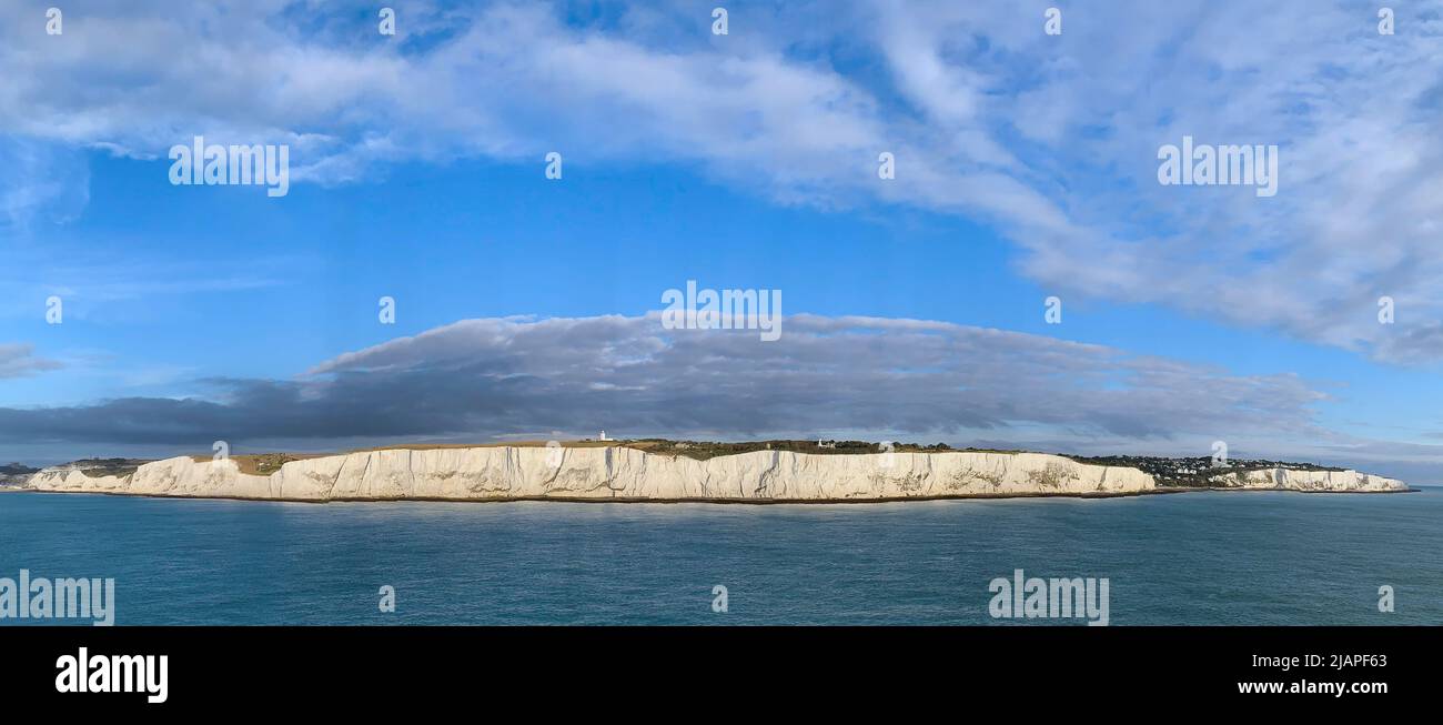 The White Cliffs of Dover, England, UK.   The White Cliffs of Dover is the stretch of English coastline facing the Strait of Dover and France. The cliff face, which reaches a height of 350 feet, owes its striking appearance to its composition of chalk accented by streaks of black flint, deposited during the Late Cretaceous period. English Channel. Stock Photo