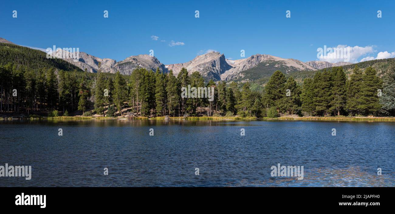 Sprague Lake with the Backdrop of High Mountain Peaks in Rocky Mountain National Park, Colorado. Stock Photo