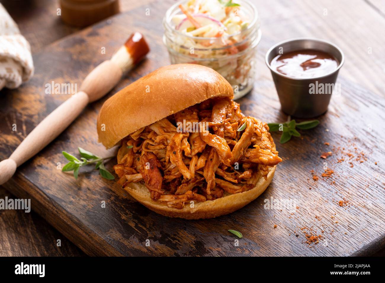 BBQ chicken sandwich on a brioche bun with coleslaw Stock Photo Alamy