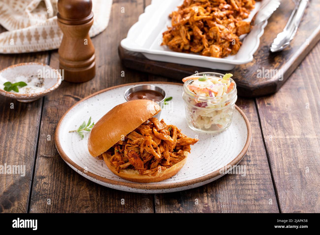 BBQ chicken sandwich on a brioche bun with coleslaw Stock Photo Alamy