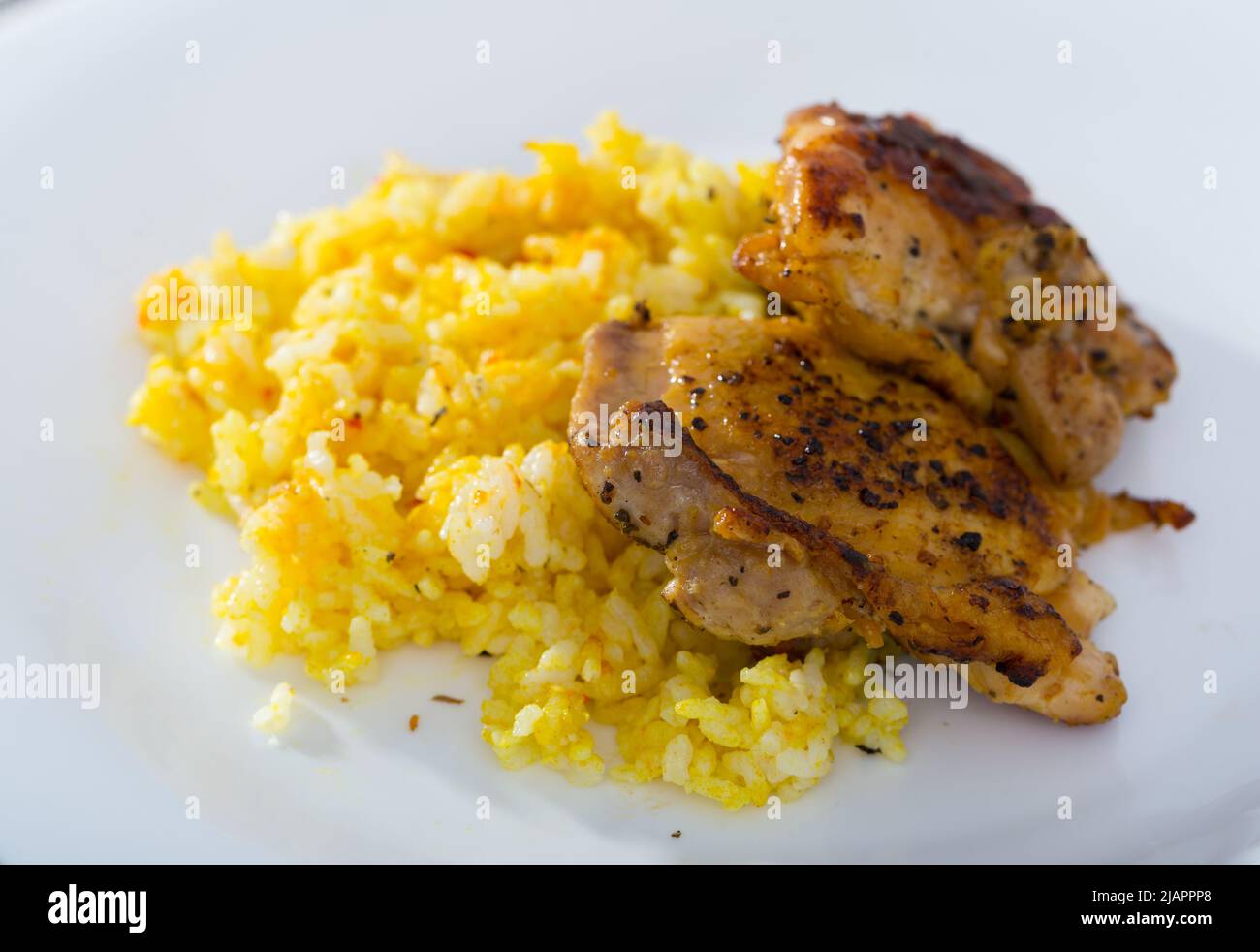 rice-with-roasted-chicken-thighs-stock-photo-alamy