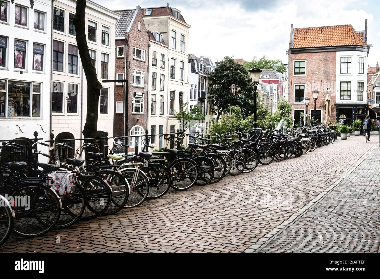 bicycle parking in the narrow streets of the old towns in the netherlands Stock Photo