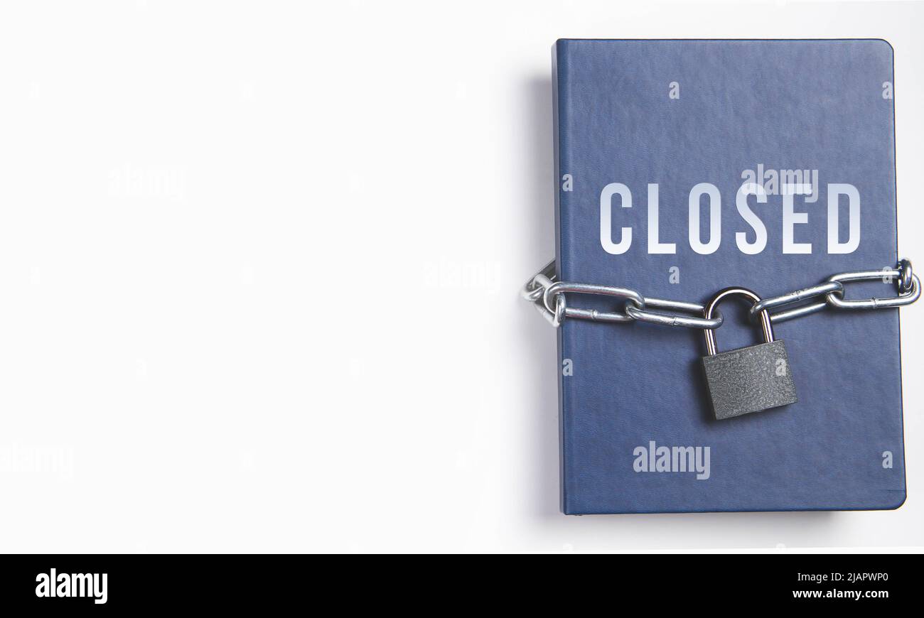 The book is locked under lock and key on a white background. Secret ...
