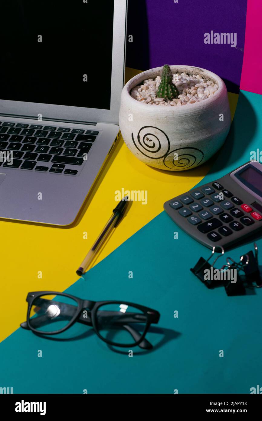 A vertical desk with office things Stock Photo Alamy