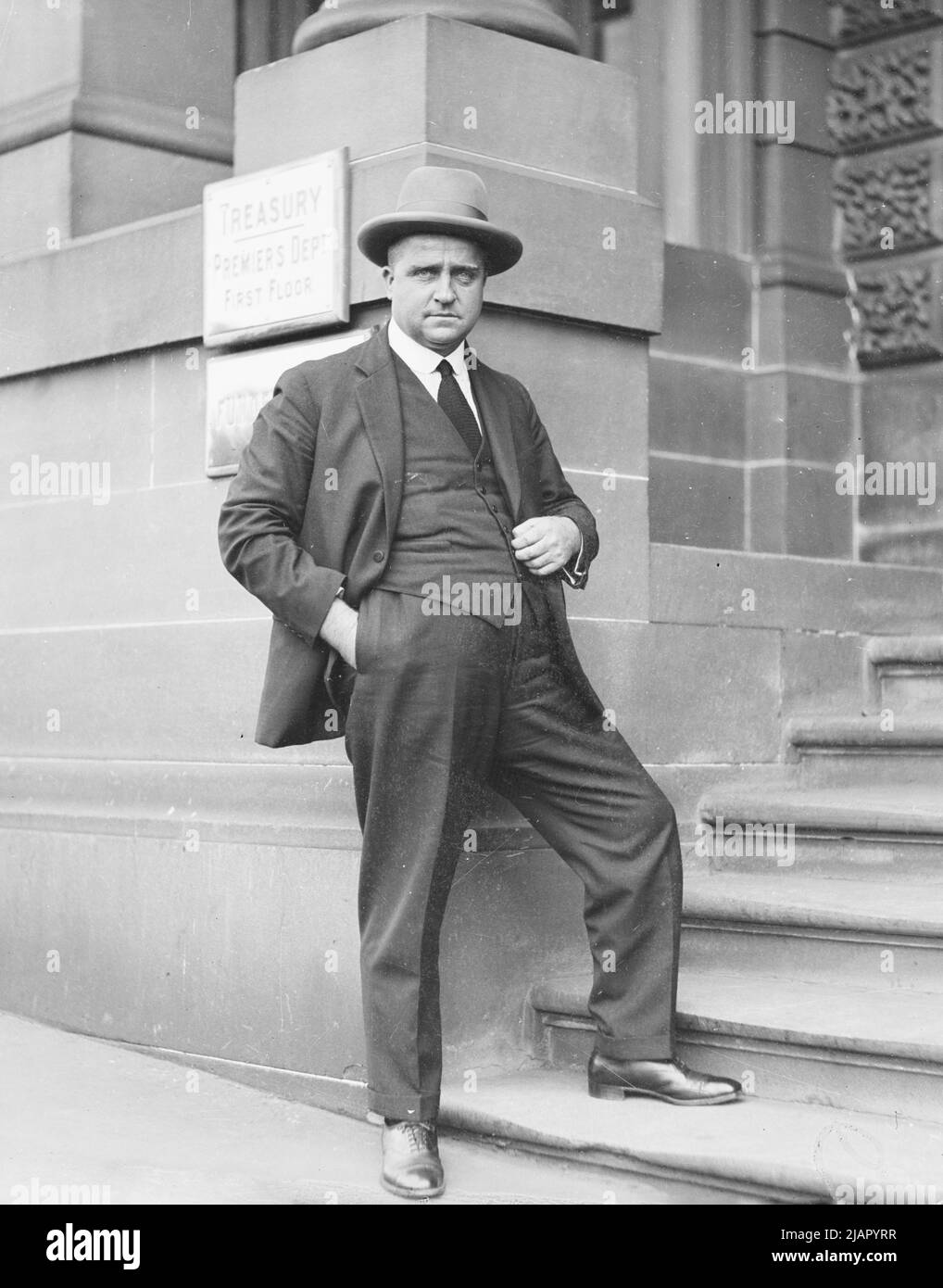 Australian politician Bertram Stevens, Premier of New South Wales, on the steps of the Treasury Building, Sydney ca. 1934 Stock Photo