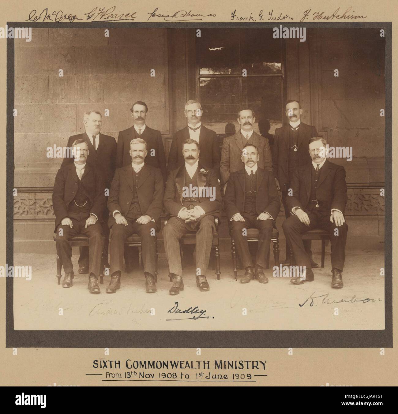 Members of the First Fisher Ministry, the Australian Labor Party government from 1908 to 1909 Back row (L-R): Gregor McGregor, Vice-President of the Executive CouncilGeorge Pearce, Minister for DefenceJosiah Thomas, Postmaster-GeneralFrank Tudor, Minister for Trade and CustomsJames Hutchison, Minister without portfolioFront row (L-R): Lee Batchelor, Minister for External AffairsAndrew Fisher, Prime Minister and TreasurerThe Earl of Dudley, Governor-GeneralBilly Hughes, Attorney-GeneralHugh Mahon, Minister for Home Affairs ca.  between 1908 and 1909 Stock Photo