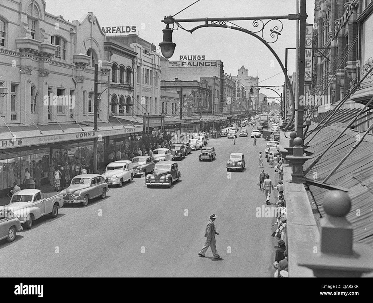 Shopping crowds on Hunter Street, possibly in Sydney Australia ca. 1953 Stock Photo