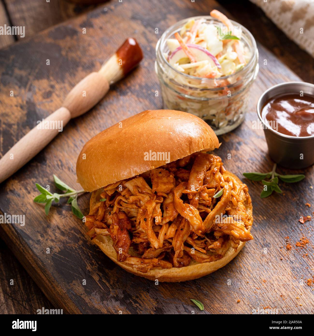 BBQ chicken sandwich on a brioche bun with coleslaw Stock Photo Alamy