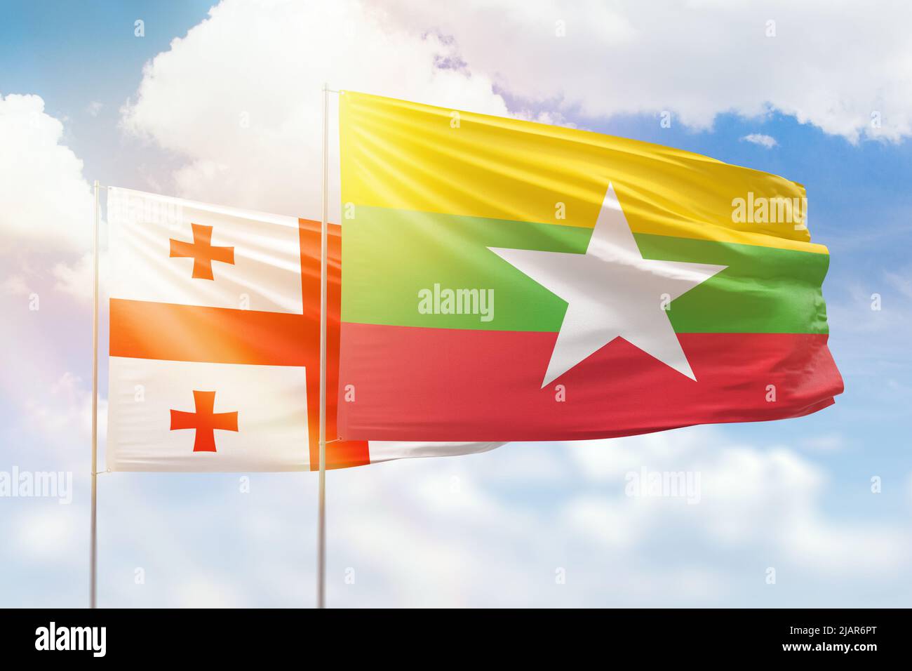 Sunny blue sky and flags of myanmar and Stock Photo Alamy