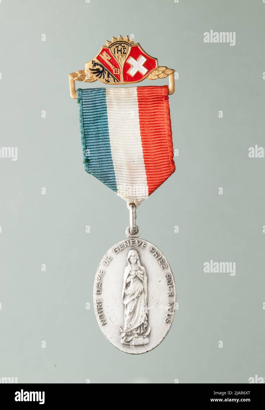 Pilgrim Badge: Notre Dame de Geve Huguenin Frères & Co. S.A. Stock Photo