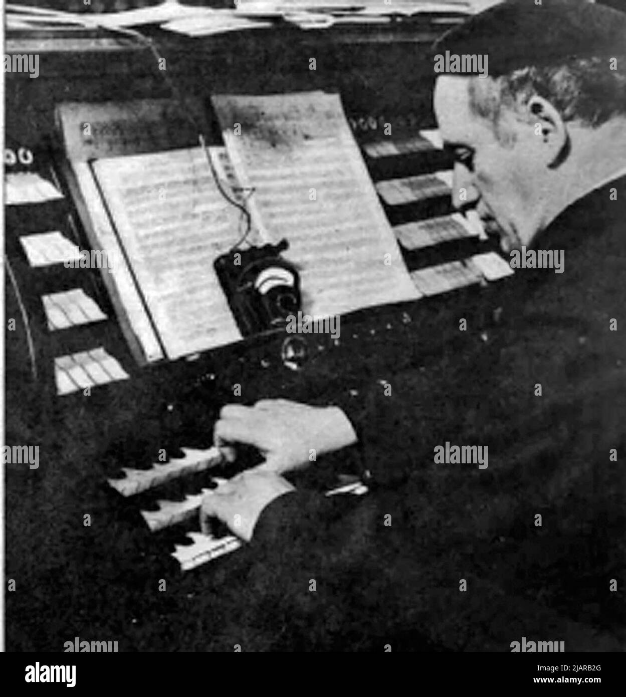 Jorg Mager playing his organ, c. 1938, PIX Magazine, Vol. 3 No. 2 (14 January 1939) Stock Photo