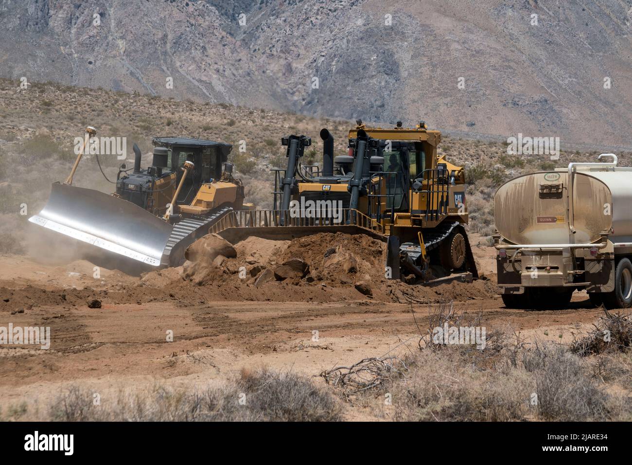These bulldozers are working on a new road project near Olancha, Inyo ...