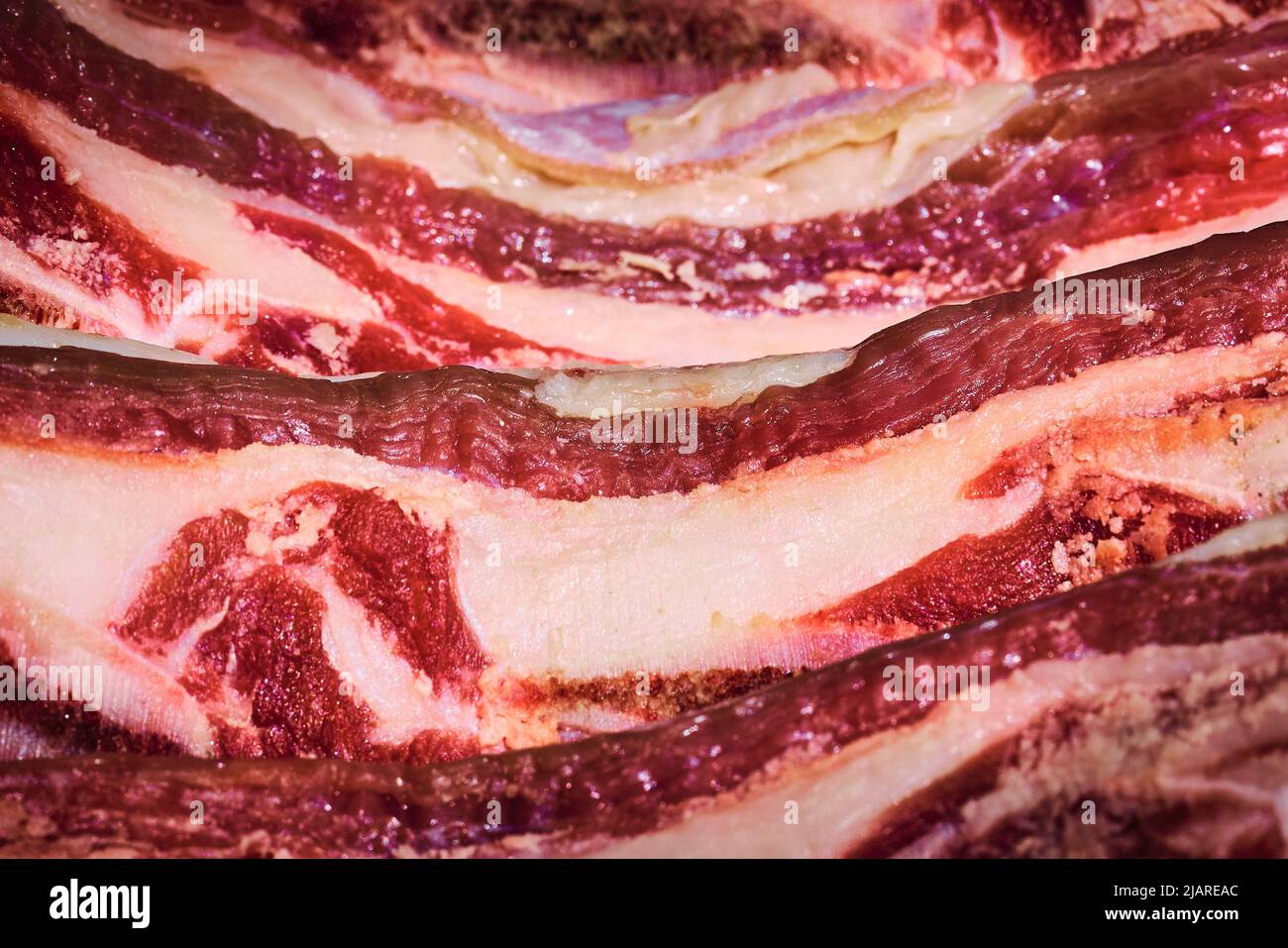 Beef rib meat prepared for grilling on the barbecue Stock Photo