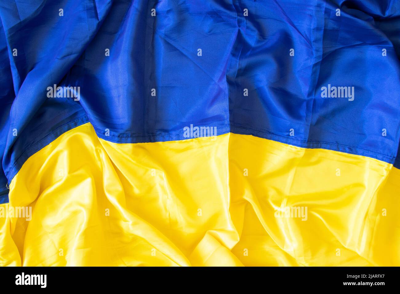 Yellow-blue national flag of Ukraine as a background, stop war and peace in Ukraine 2022 Stock Photo
