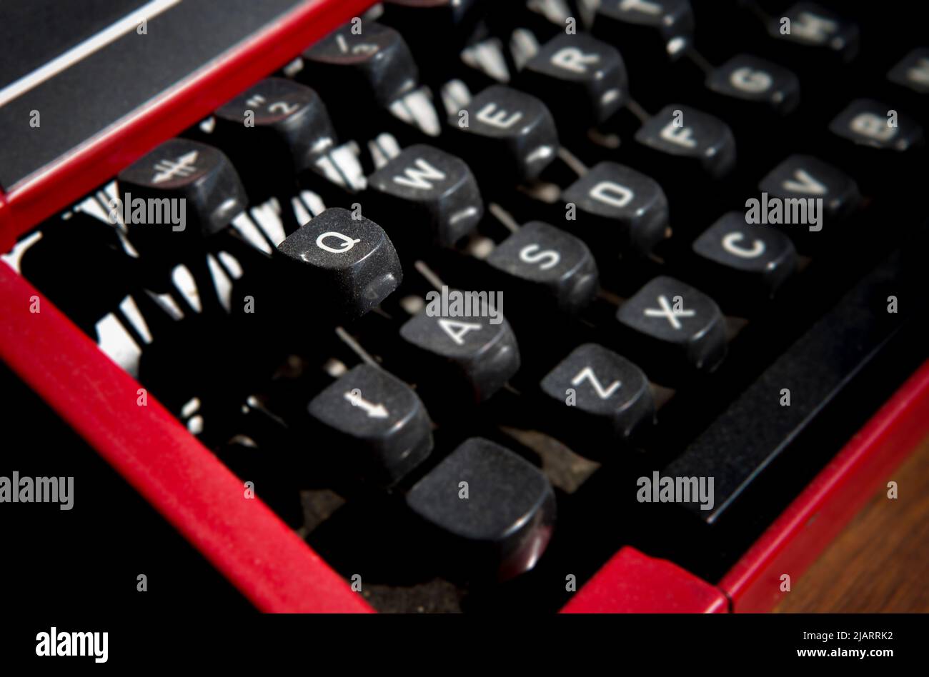 1970s dusty typewriter. Selective focus on key Q Stock Photo