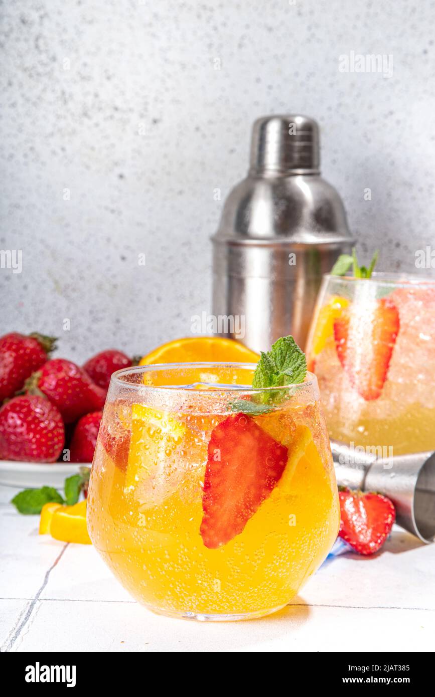 Homemade Summer Sparkling White Wine Sangria. Cold fizz fruit and berry
