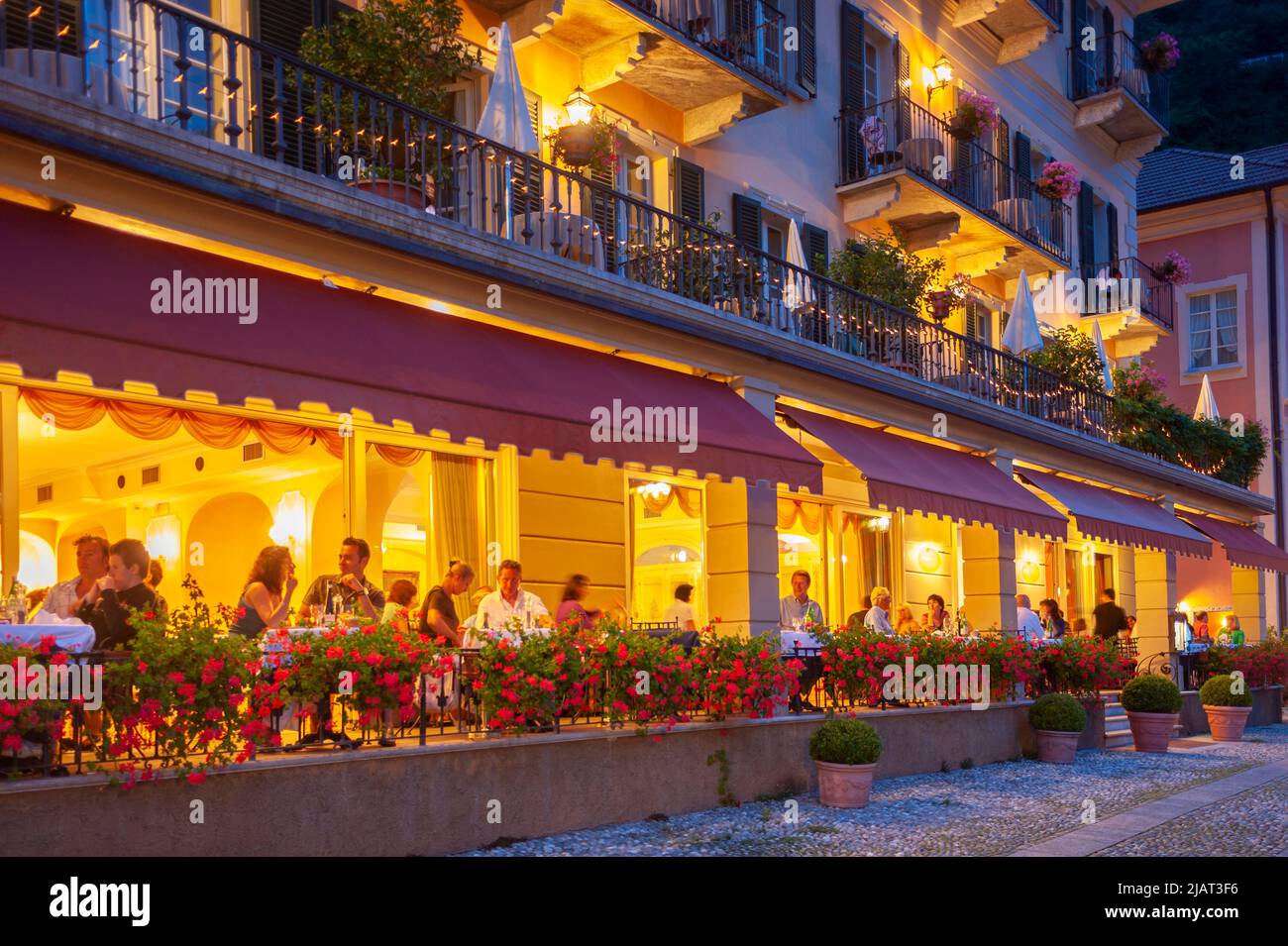Promenade and restaurant on the shore of Lake Maggiore, Cannero Riviera, Piedmont, Italy, Europe Stock Photo
