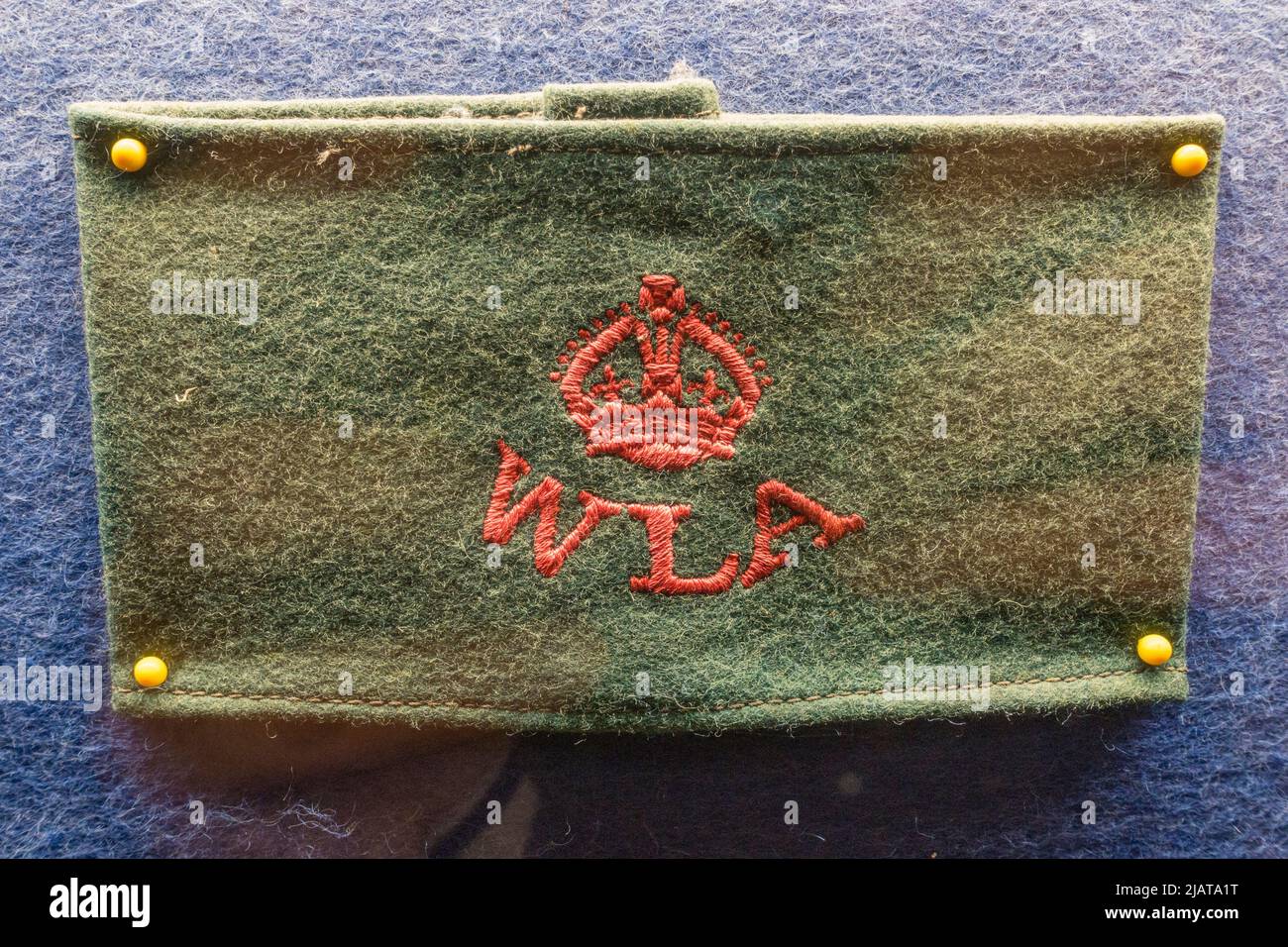 A Womens Land Army (WLA) armband in Eden Camp Modern History Theme Museum near Malton, North Yorkshire, England. Stock Photo