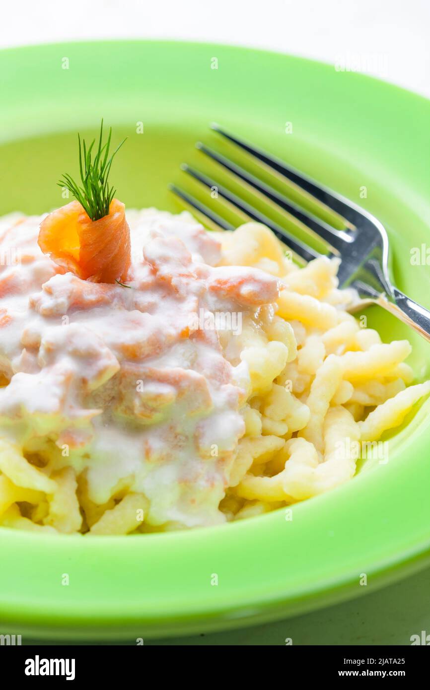 spetzle with sauce of smoked salmon Stock Photo Alamy