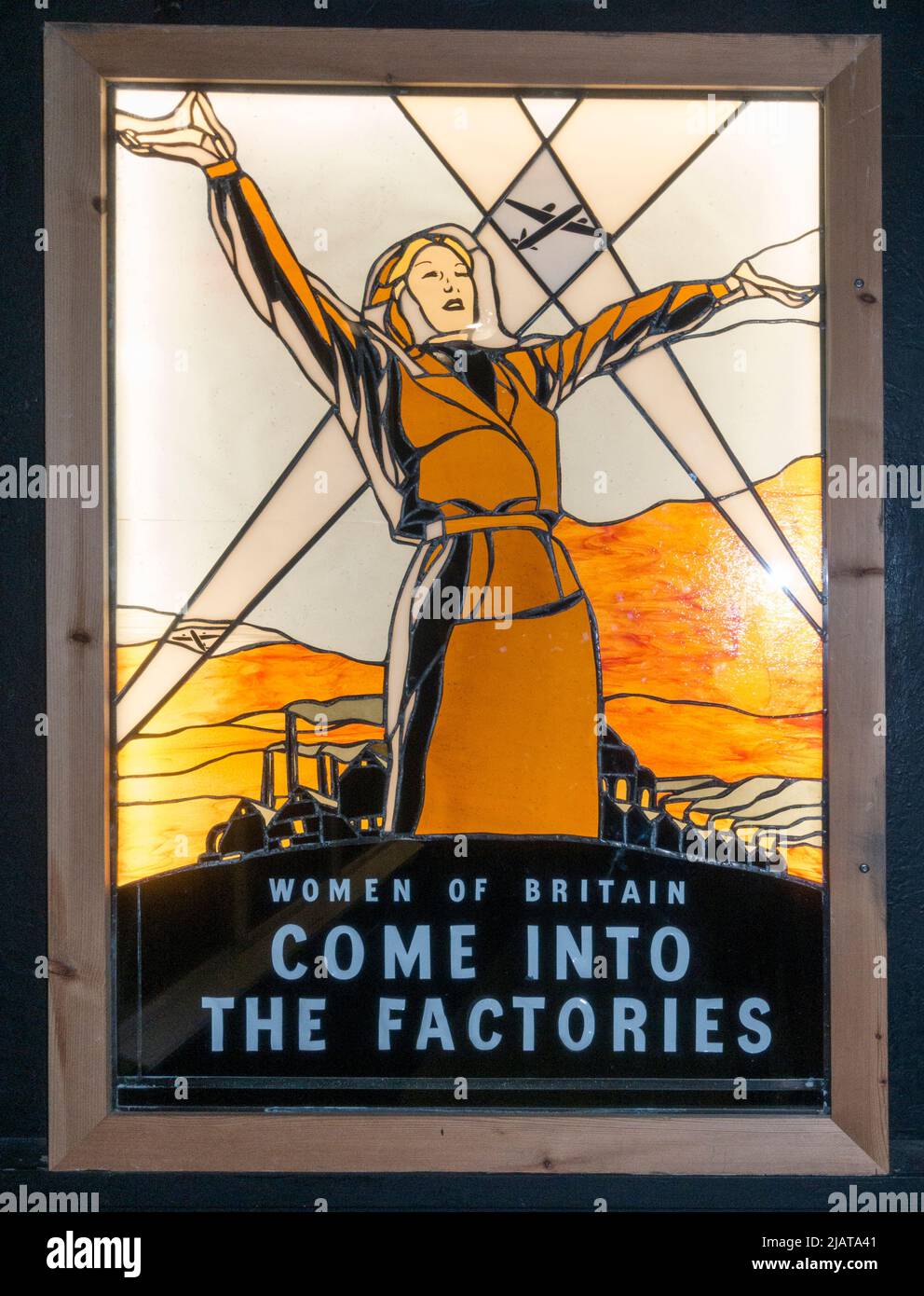 'Women of Britain Come Into the Factories' stained glass window in Eden Camp Modern History Theme Museum near Malton, North Yorkshire, England. Stock Photo