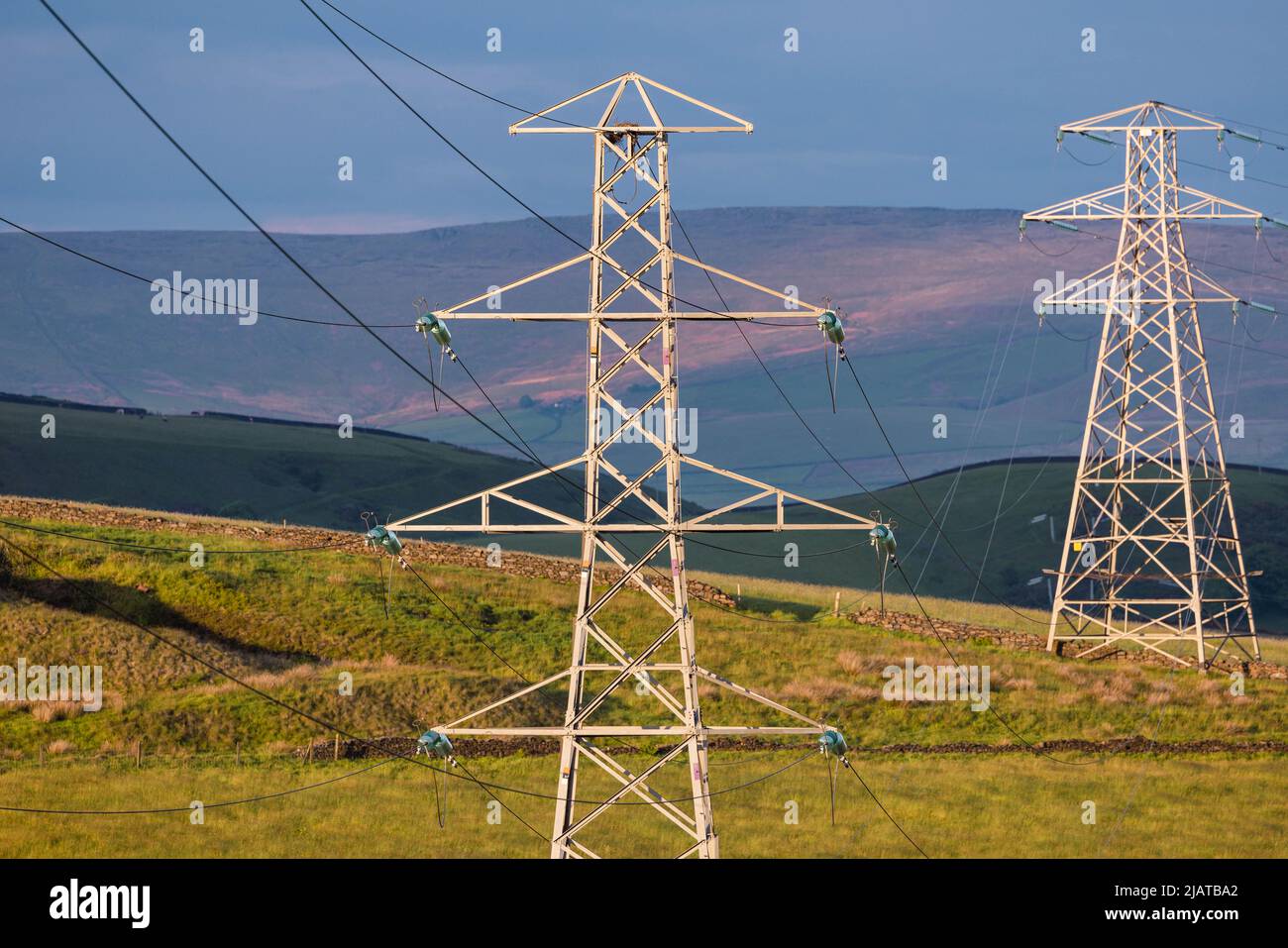 Electricity pylons in Bury countryside. Stock Photo