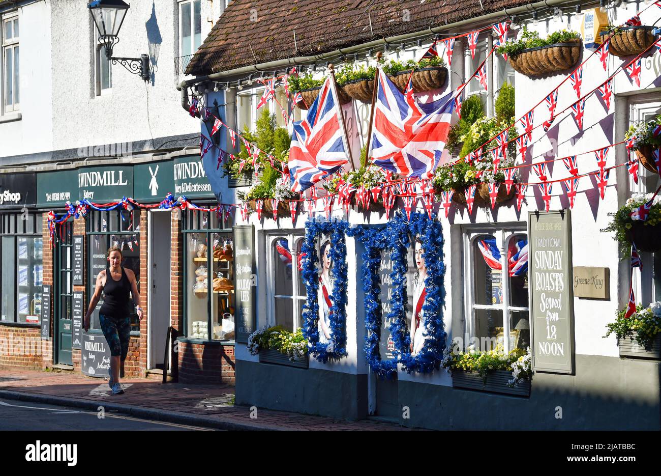 Brighton UK 1st June 2022 - Ye Olde Black Horse in Rottingdean village near Brighton is decorated and ready for the Queen's Platinum Jubilee Celebrations over the next few days : Credit Simon Dack / Alamy Live News Stock Photo