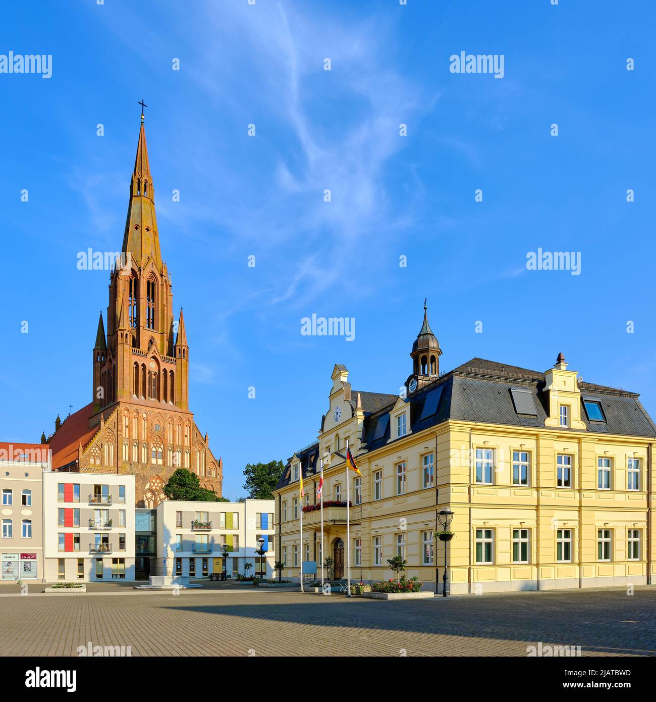 Hanseatic Town of Demmin, Mecklenburg-Western Pomerania, Germany, August 7, 2020: Town hall and Bartholomew's Church. Stock Photo