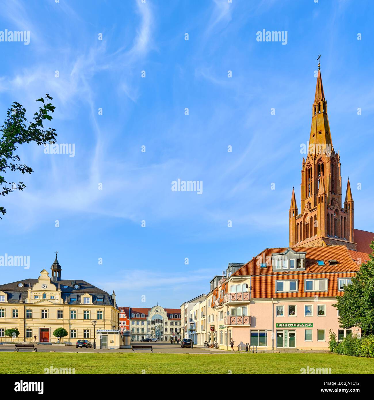 Hanseatic Town of Demmin, Mecklenburg-Western Pomerania, Germany, August 7, 2020: Town hall and Bartholomew's Church. Stock Photo