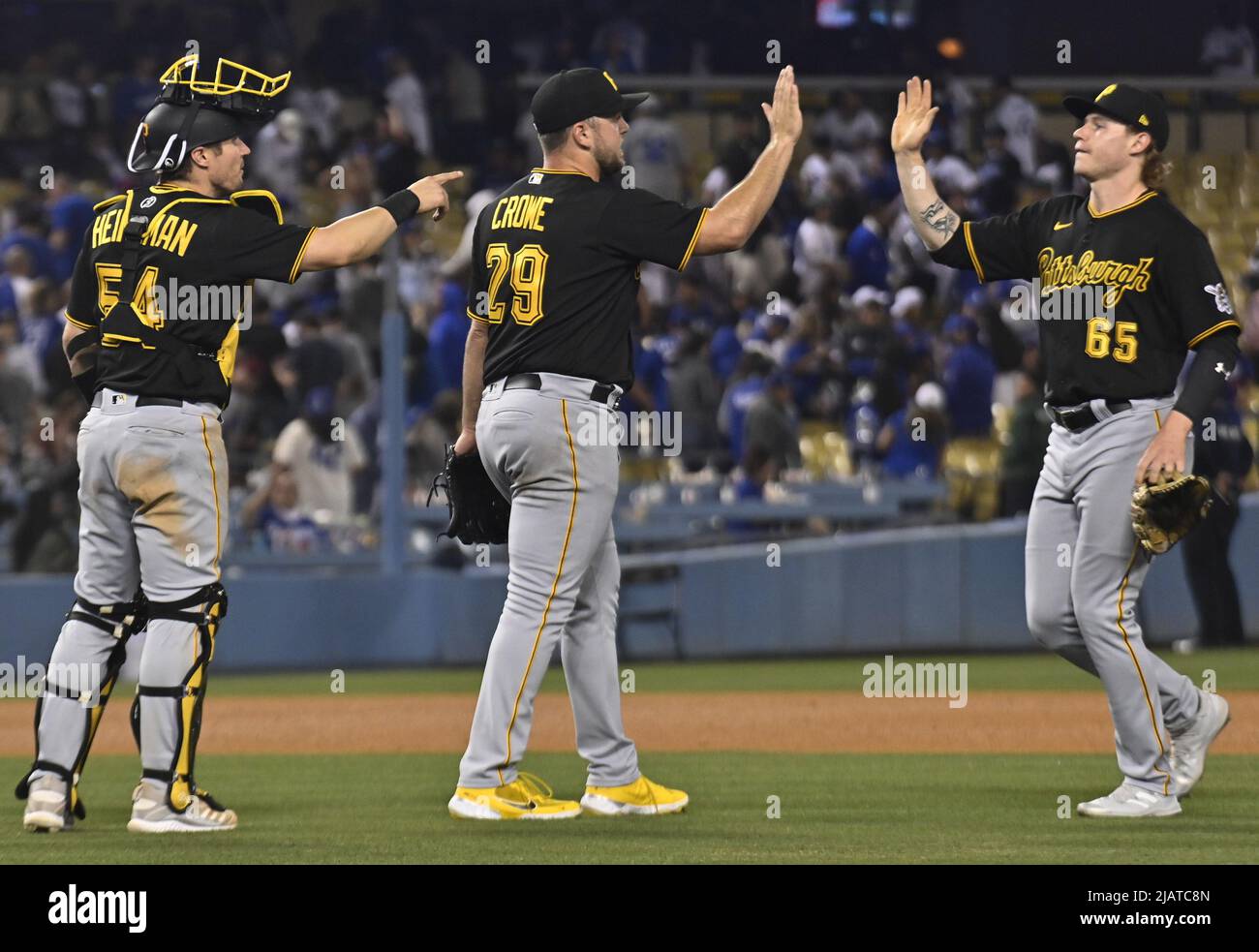 Los Angeles, United States. 01st June, 2022. Pittsburgh Pirates relief pitcher Will Crowe (29) celebrates with teammates after defeating the Los Angeles Dodgers to earn his second season save at Dodger Stadium in Los Angeles on Tuesday May 31, 2022. The Prates beat the Dodgers 5-3 for their second series win. Photo by Jim Ruymen/UPI Credit: UPI/Alamy Live News Stock Photo