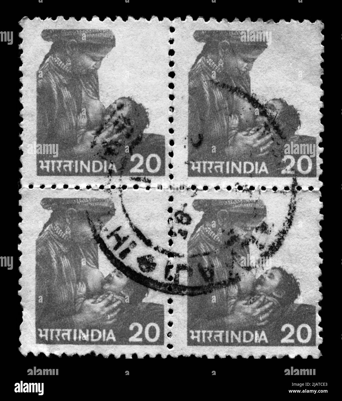 Stamp print in India,mother, motherhood, breastfeeding, feeding Stock Photo