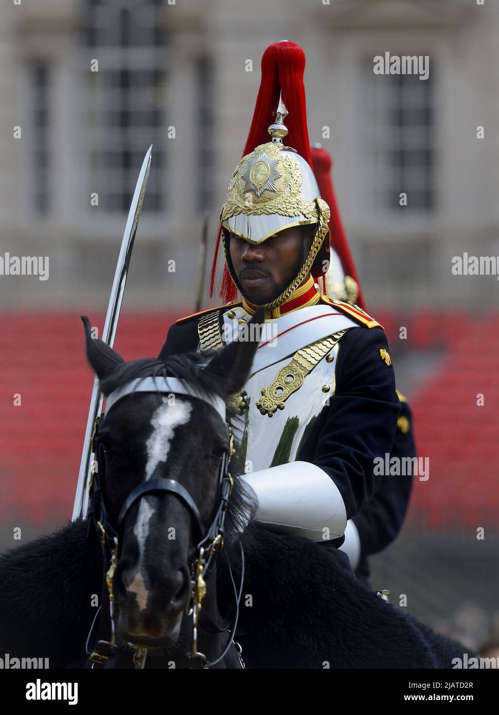 London, England, UK. Daily Changing of the Guard in Horse Guards Parade - black member of the Blues and Royals Stock Photo