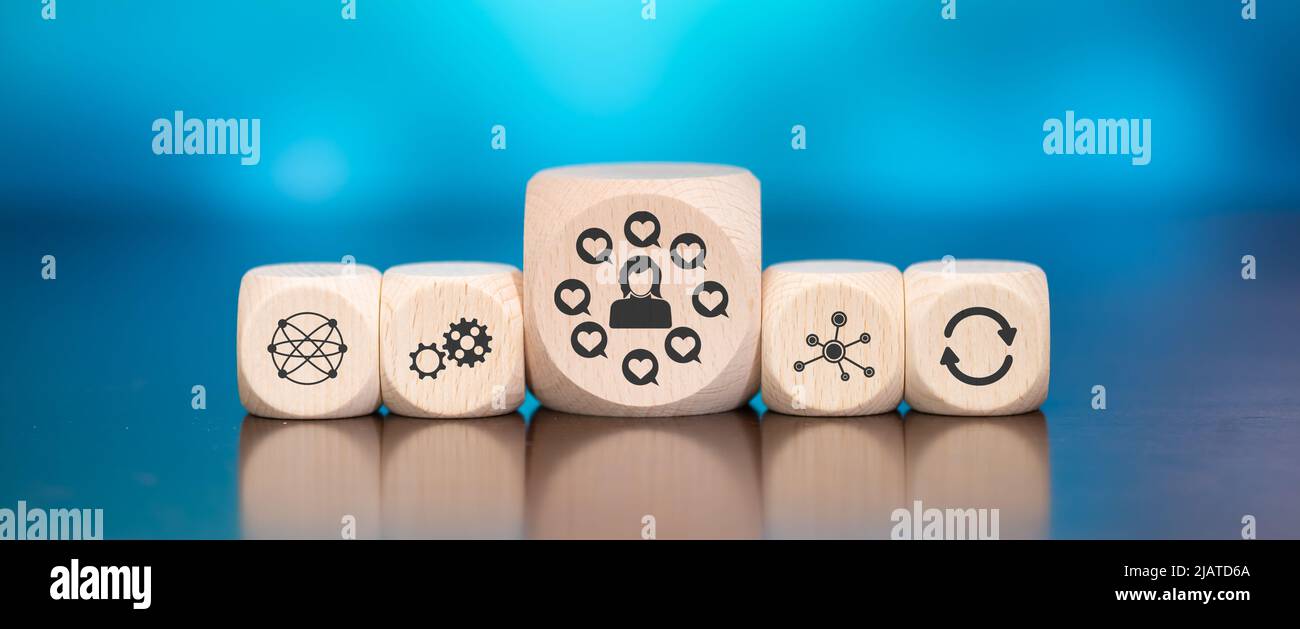 Wooden blocks with symbol of followers concept on blue background Stock ...