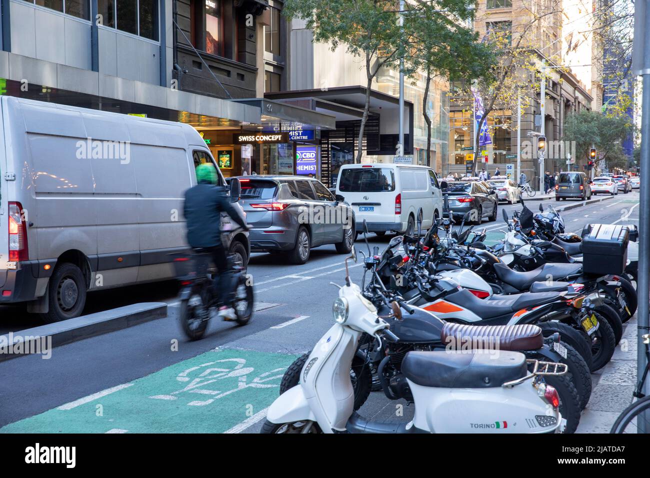 Sydney city centre, traffic queue and congestion on Pitt street, motorcycle parking bay beside bicycle lane,NSW,Australia Stock Photo