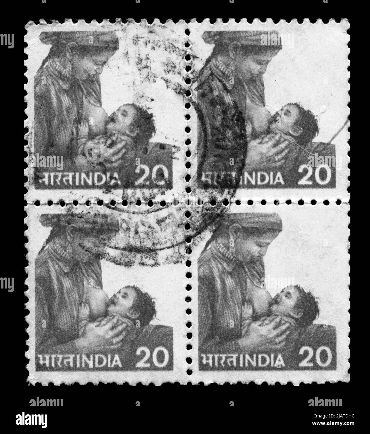Stamp print in India,mother, motherhood, breastfeeding, feeding Stock Photo