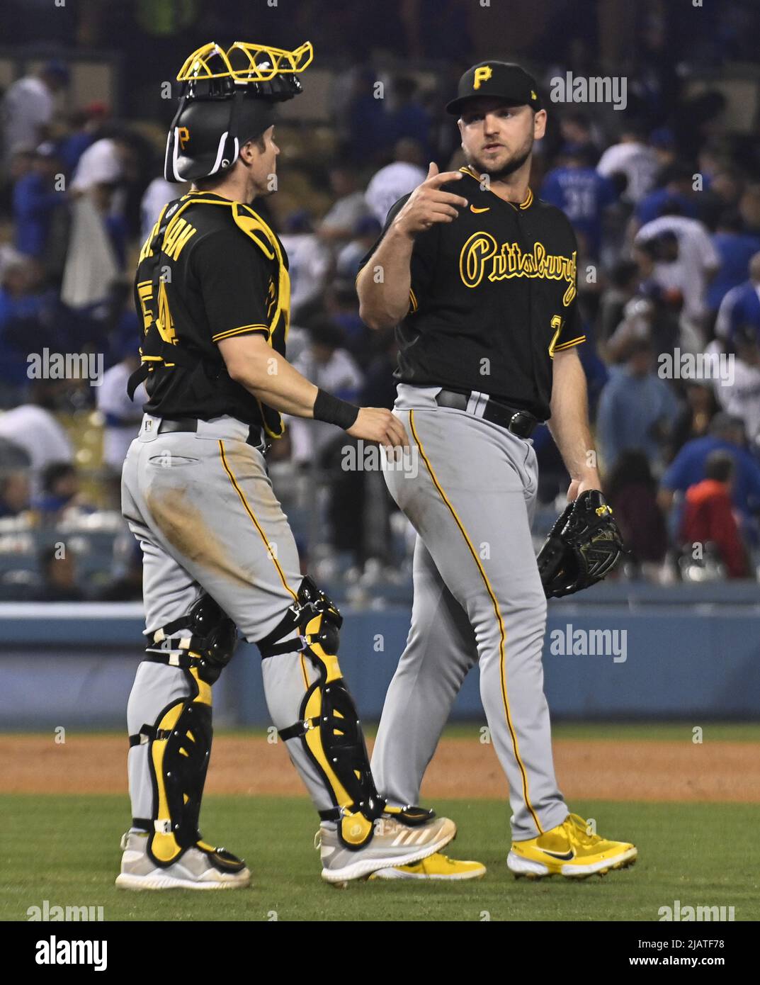 Los Angeles, United States. 01st June, 2022. Pittsburgh Pirates relief pitcher Will Crowe celebrates with catcher Tyler Heineman after defeating the Los Angeles Dodgers to earn his second season save at Dodger Stadium in Los Angeles on Tuesday, May 31, 2022. The Prates beat the Dodgers 5-3 for their second series win. Photo by Jim Ruymen/UPI Credit: UPI/Alamy Live News Stock Photo