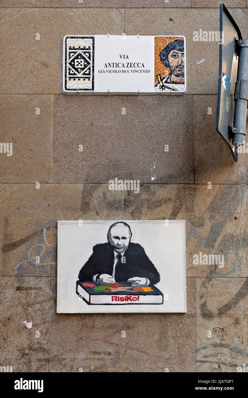 Painting of the President of Russia Vladimir Putin with the game of Risko. On a street in the city center of Ravenna. Emilia-Romagna, Italy, Europe EU Stock Photo