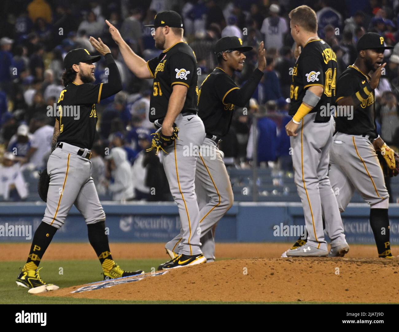 Pittsburgh Pirates relief pitcher David Bednar (51) high-fives Michael Chavis after defeating the Los Angeles Dodgers 6-5 at Dodger Stadium in Los Angeles on Monday, May 30, 2022.  Photo by Jim Ruymen/UPI Stock Photo