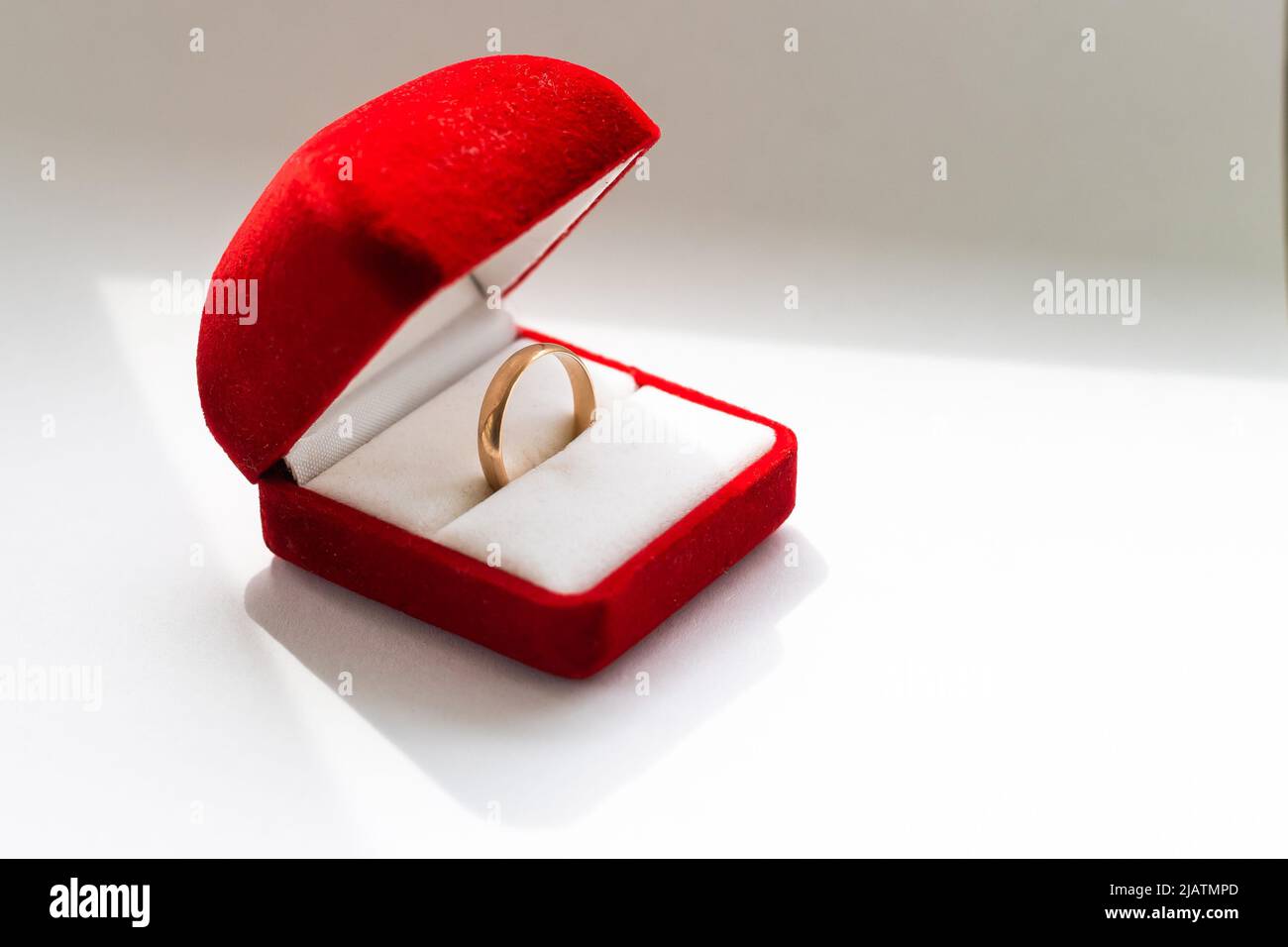 wedding ring in a red box Stock Photo Alamy