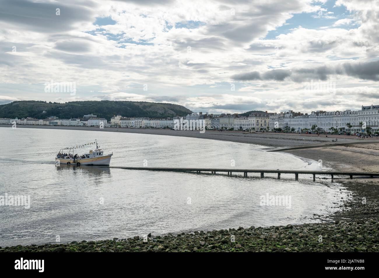 Sight seeing tourist boat trip in Llandudno bay on the North Wales coast Stock Photo