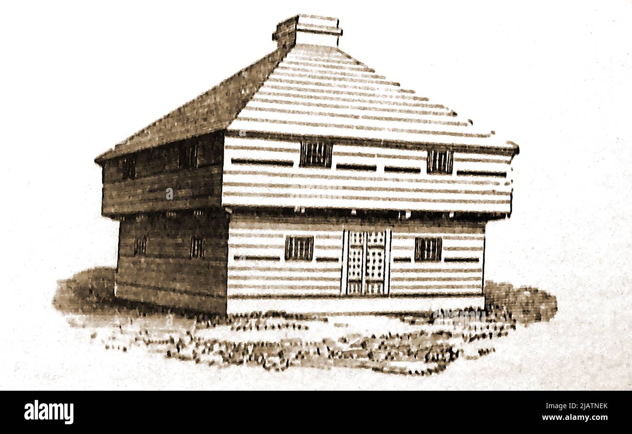 An historic old illustration of a British wooden-built military blockhouse for use by musketeers , built with rifle holes all round on two stories . They were used for defensive purposes in isolated locations. The name is said not to refer to its shape, but instead to its purpose in blocking access to enemy forces. Stock Photo