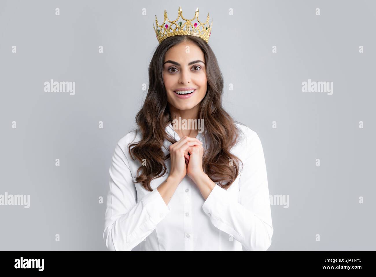 queen and smiling king with crowns holding hands isolated on grey Stock  Photo - Alamy