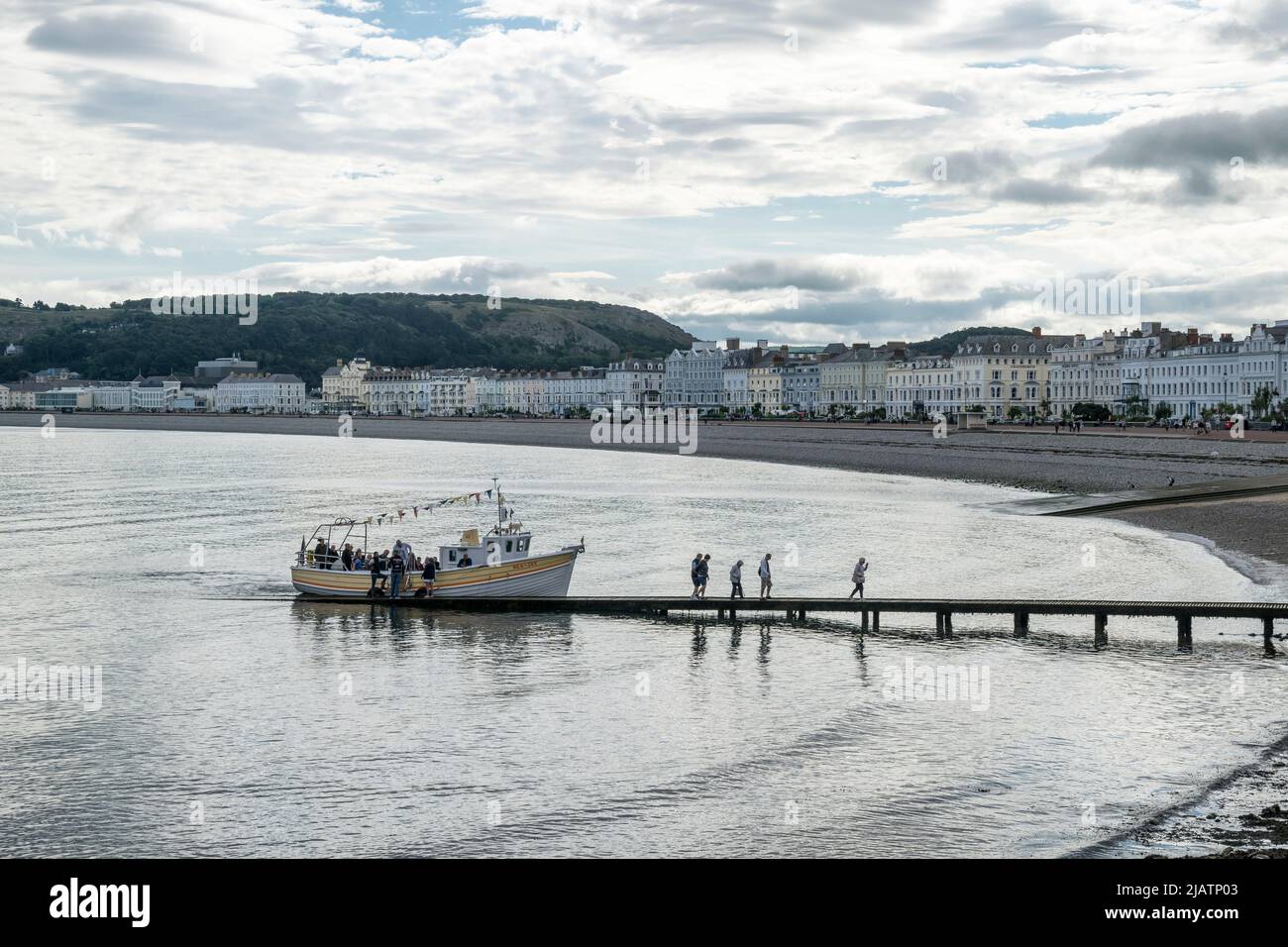 Sight seeing tourist boat trip in Llandudno bay on the North Wales coast Stock Photo
