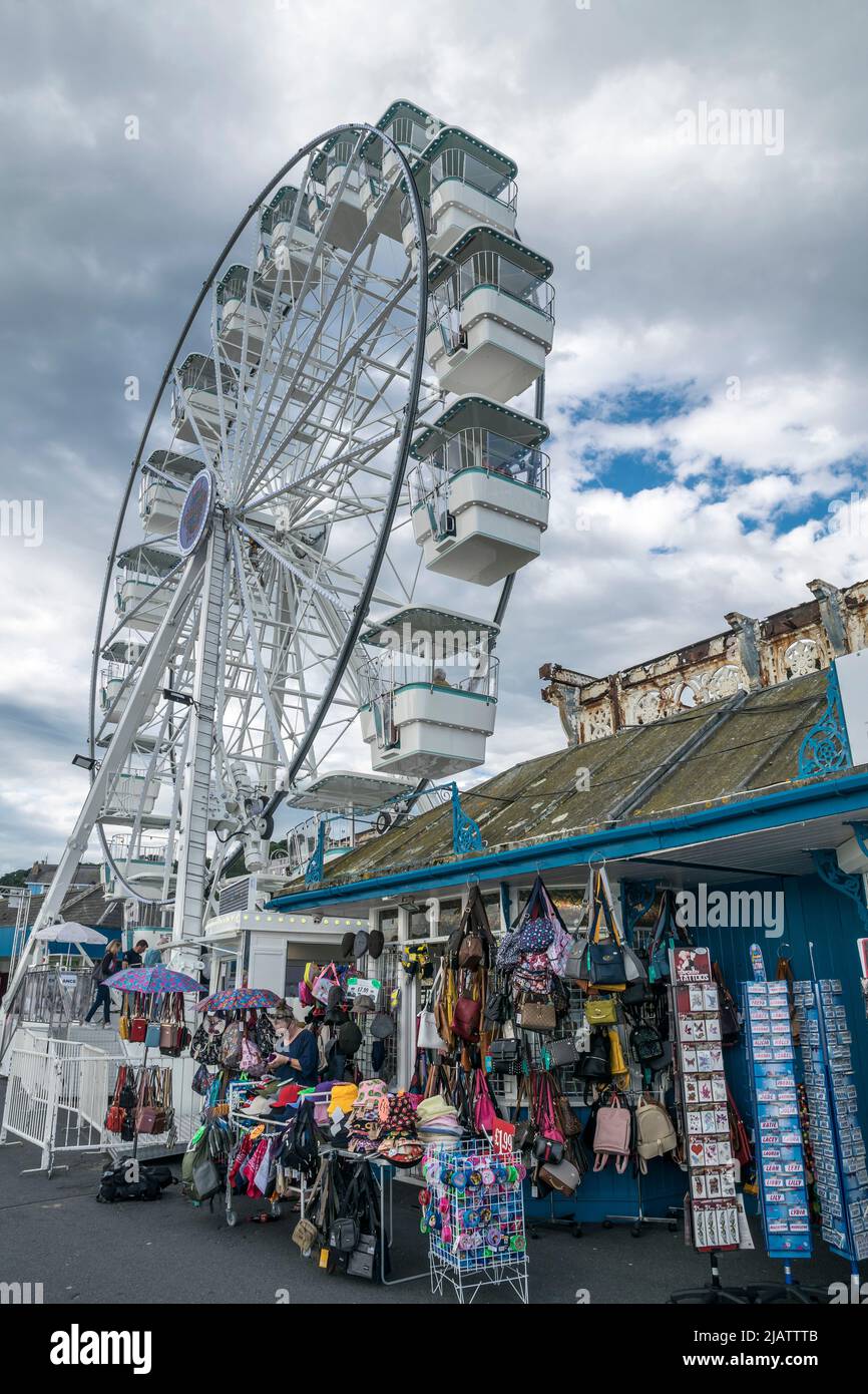 Llandudno on the North Wales coast showing  the new ferris wheel located at the start of the pier Stock Photo